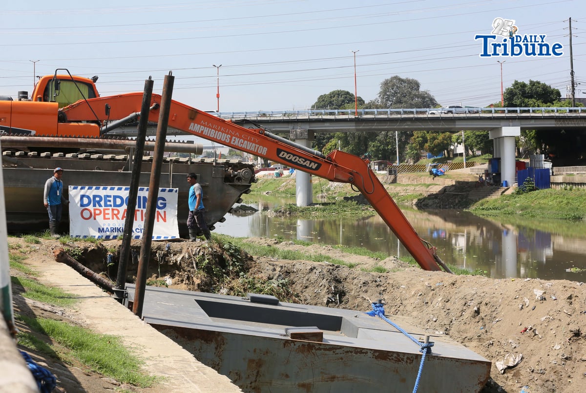 Heavy equipment from the Marikina local government conducts dredging and widening operations along the Marikina River on Tuesday, 20 May 2026, as part of flood mitigation efforts and to maintain the river’s capacity to handle large volumes of water during heavy rains.