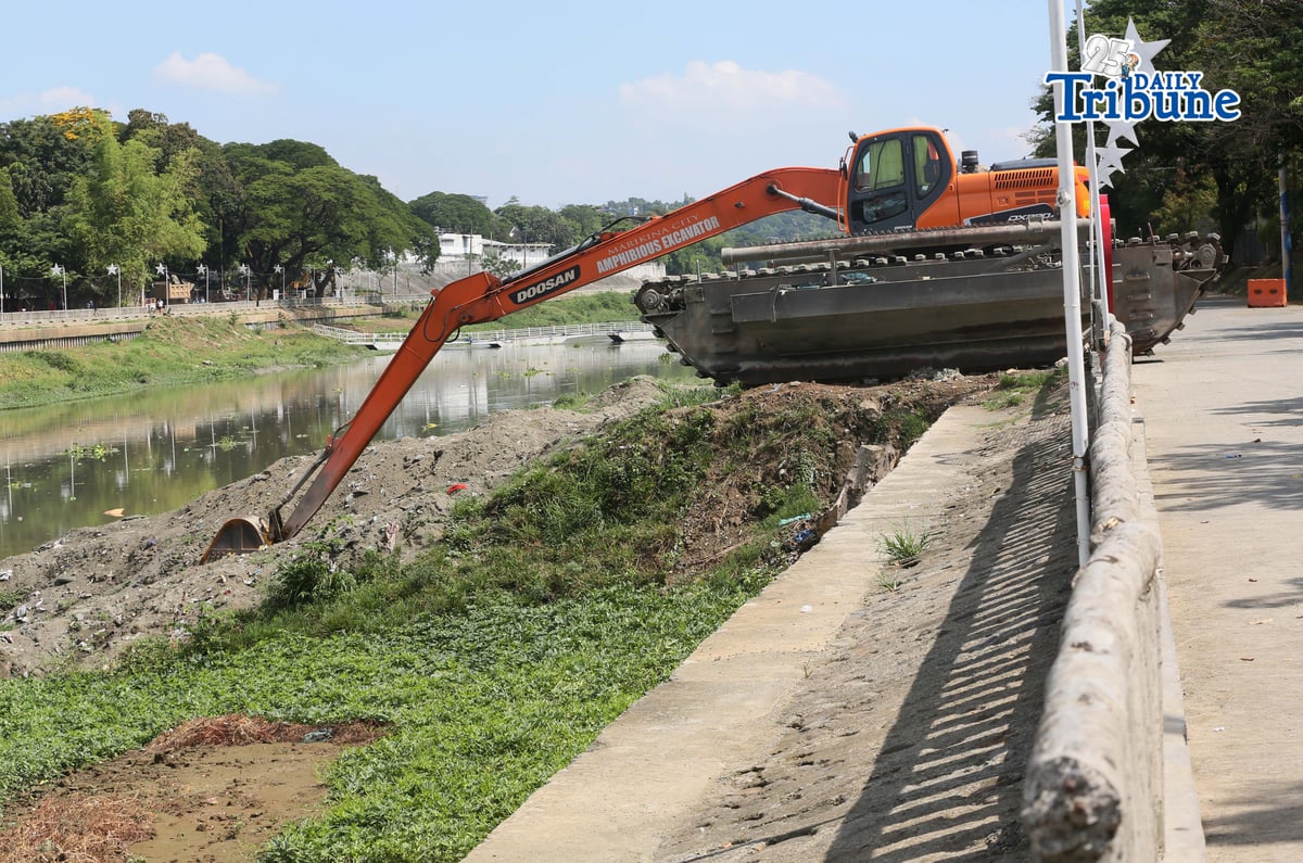 Heavy equipment from the Marikina local government conducts dredging and widening operations along the Marikina River on Tuesday, 20 May 2026, as part of flood mitigation efforts and to maintain the river’s capacity to handle large volumes of water during heavy rains.