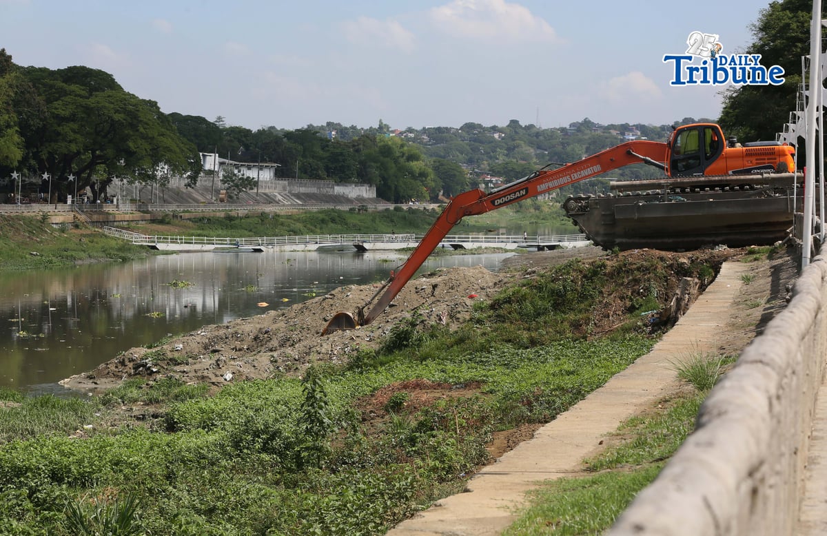 Heavy equipment from the Marikina local government conducts dredging and widening operations along the Marikina River on Tuesday, 20 May 2026, as part of flood mitigation efforts and to maintain the river’s capacity to handle large volumes of water during heavy rains.
