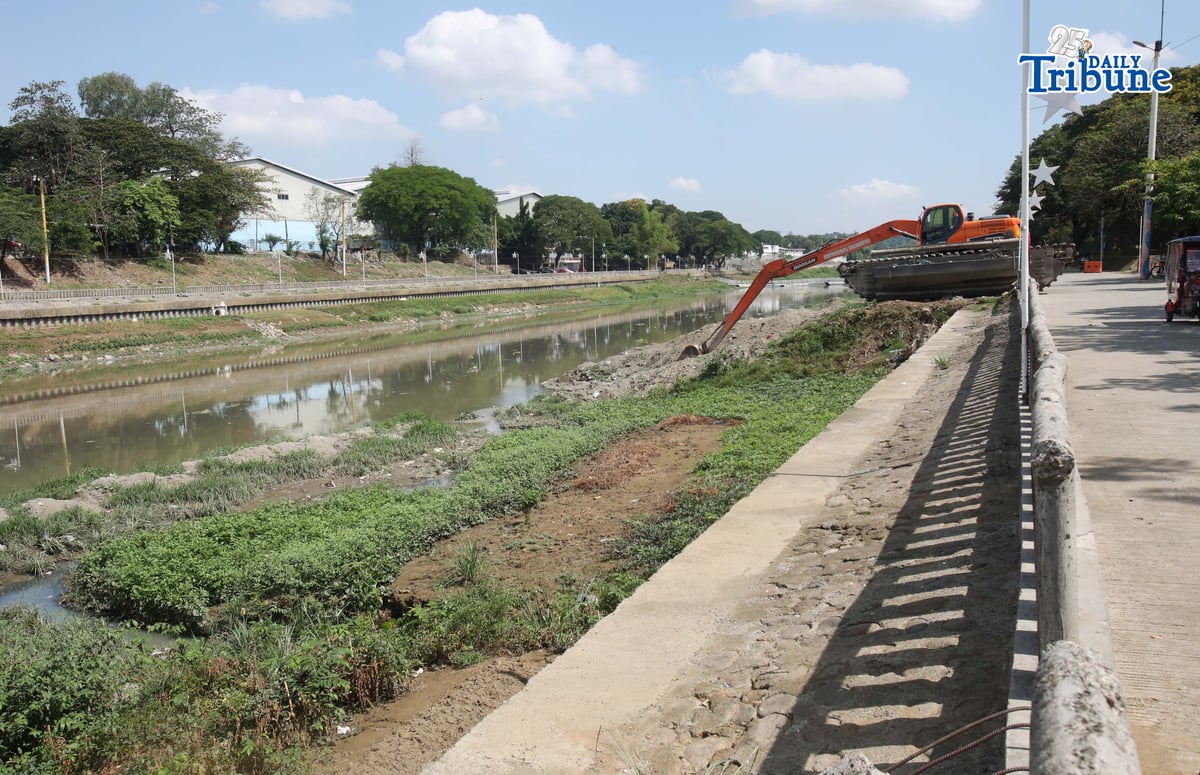 Heavy equipment from the Marikina local government conducts dredging and widening operations along the Marikina River on Tuesday, 20 May 2026, as part of flood mitigation efforts and to maintain the river’s capacity to handle large volumes of water during heavy rains.