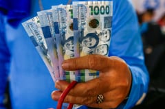 Motorcycle taxi drivers receive cash relief