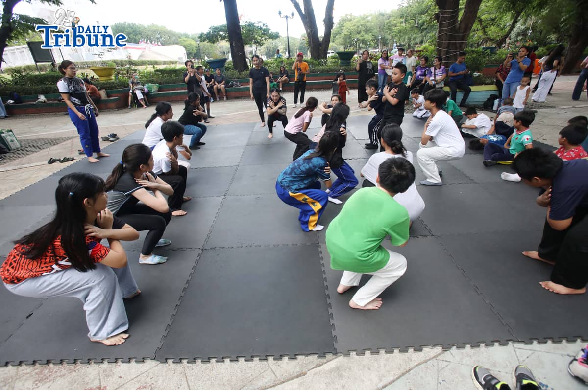 (May 23 2026) Professor Ayjell De Castro and Professor Alex Lee teach Jiu Jitsu basic self-defence skills to kids ages 10 to 15, at Quezon City Circle on Saturday May 23 2026, a free summer workshop conducted by Quezon City Government. Photo/Analy Labor