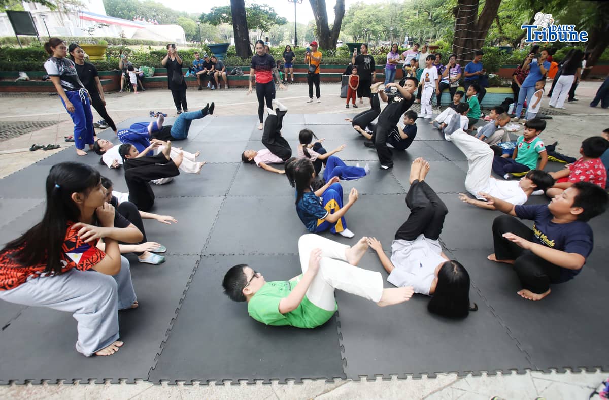 (May 23 2026) Professor Ayjell De Castro and Professor Alex Lee teach Jiu Jitsu basic self-defence skills to kids ages 10 to 15, at Quezon City Circle on Saturday May 23 2026, a free summer workshop conducted by Quezon City Government. Photo/Analy Labor