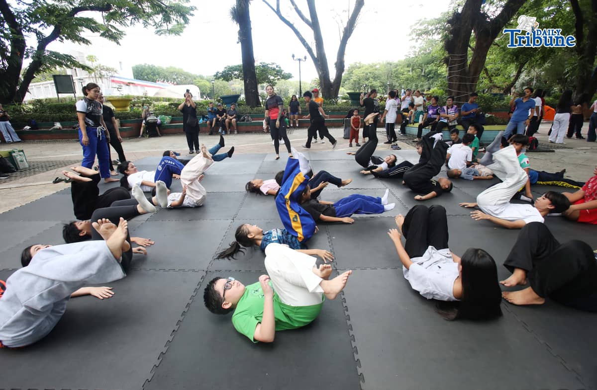 (May 23 2026) Professor Ayjell De Castro and Professor Alex Lee teach Jiu Jitsu basic self-defence skills to kids ages 10 to 15, at Quezon City Circle on Saturday May 23 2026, a free summer workshop conducted by Quezon City Government. Photo/Analy Labor