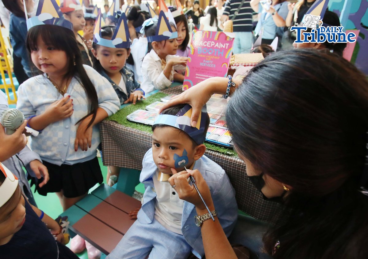 (May 23 2026) Kids enjoy playing, hugging the Bluey and Bingo mascots and the face paint, during the launching of Bluey Playdates with Friends at SM Marikina on Saturday May 23 2026, highlighted by a ribbon cutting ceremony and fun meet & greet photo opportunities with Bluey and Bingo mascots. The interactive garden-inspired play area lets families enjoy immersive photo spots and playful moments at the mall atrium as part of the Project: Playverse of SM Supermalls. Photo/Analy Labor