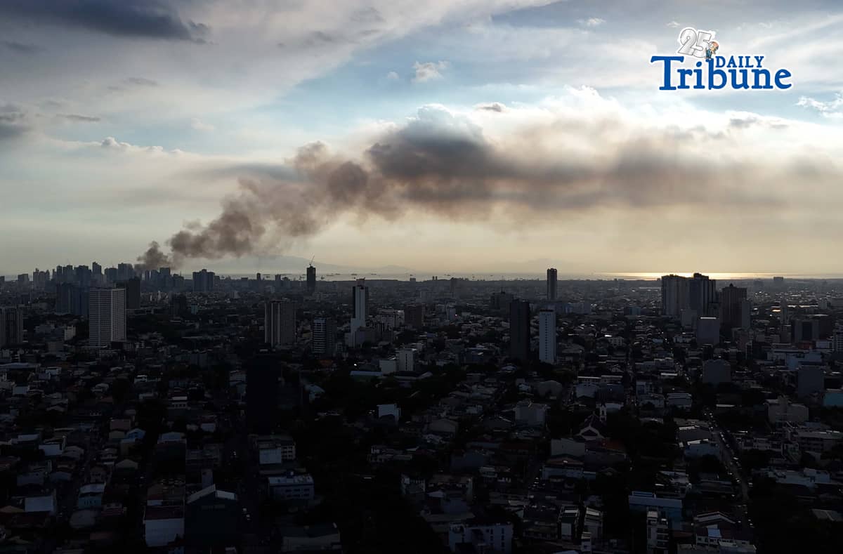(May 23 2026) Smoke from the fire at Delpan Binondo Manila, that reached up to task force Charlie was seen from Quezon City, on Saturday May 23 2026. Photo/Analy Labor