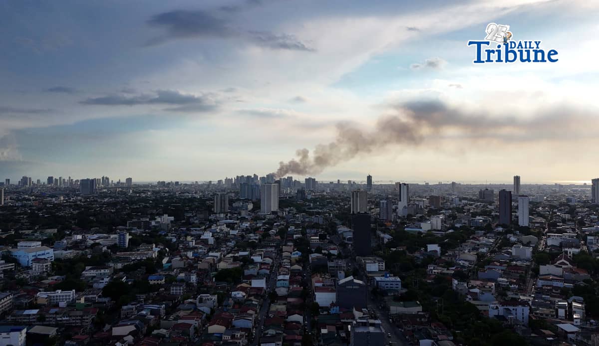 (May 23 2026) Smoke from the fire at Delpan Binondo Manila, that reached up to task force Charlie was seen from Quezon City, on Saturday May 23 2026. Photo/Analy Labor