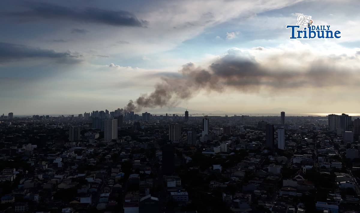(May 23 2026) Smoke from the fire at Delpan Binondo Manila, that reached up to task force Charlie was seen from Quezon City, on Saturday May 23 2026. Photo/Analy Labor