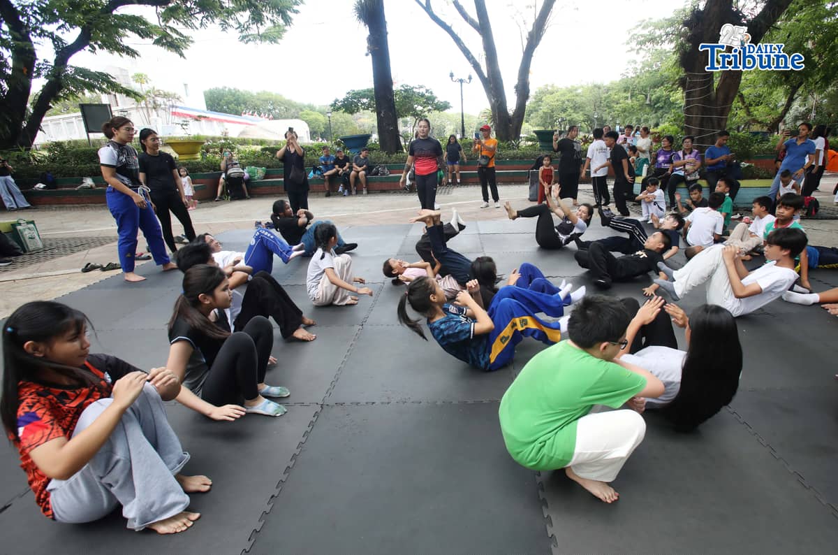 (May 23 2026) Professor Ayjell De Castro and Professor Alex Lee teach Jiu Jitsu basic self-defence skills to kids ages 10 to 15, at Quezon City Circle on Saturday May 23 2026, a free summer workshop conducted by Quezon City Government. Photo/Analy Labor