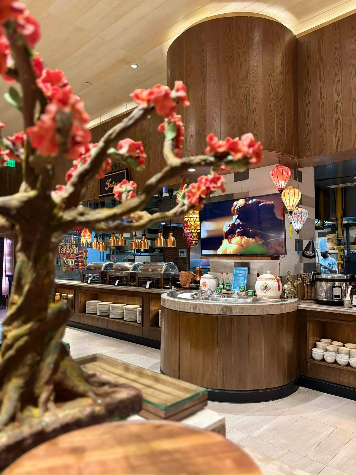 BUFFET selections, decorative lanterns and floral displays.