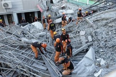 35 given aid from collapsed building in Angeles City