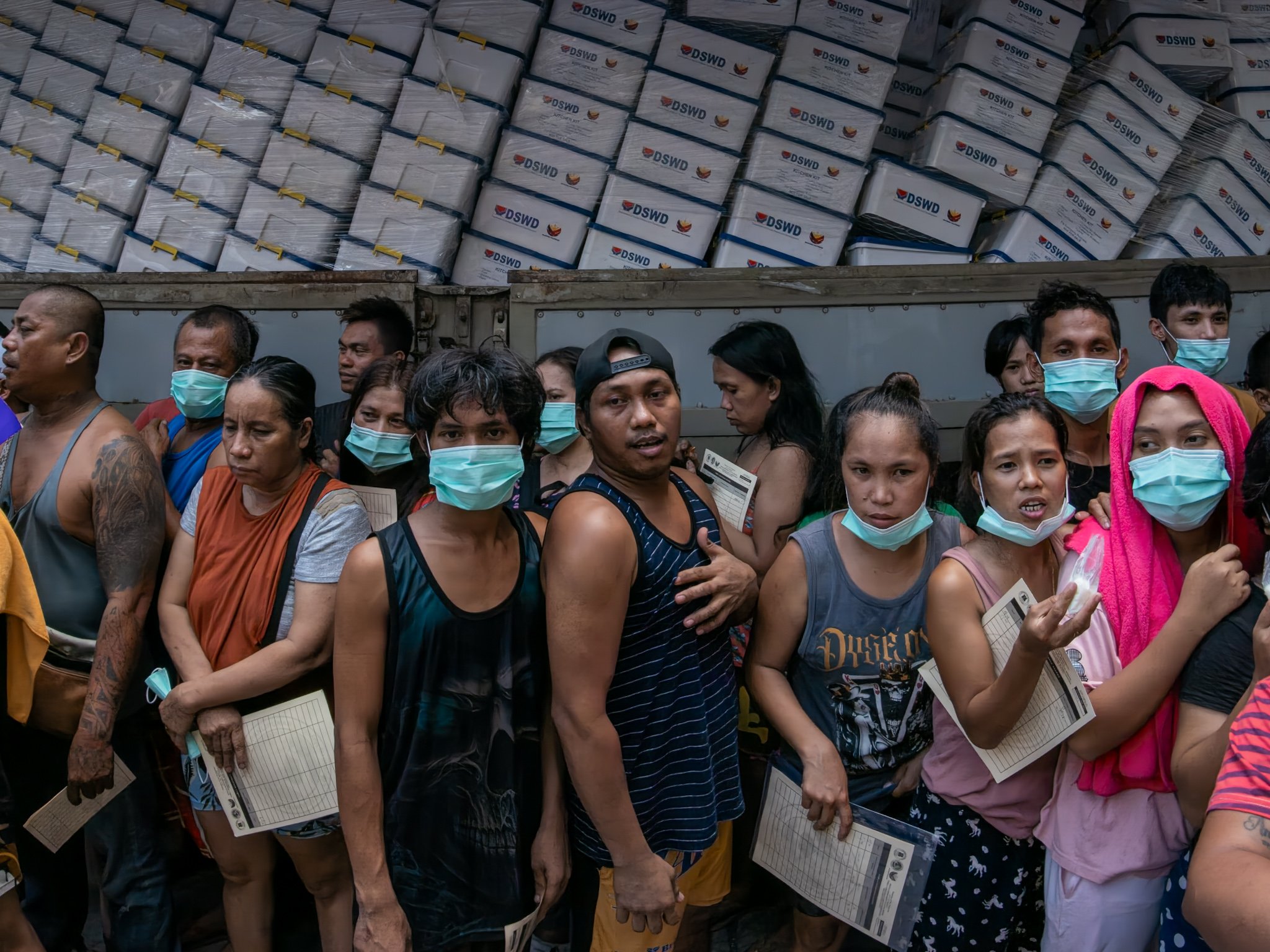 Food, financial aid deployed amid massive Parola Compound blaze