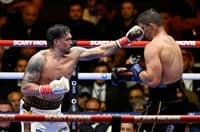 OLEKSANDR Usyk lands a punch on Rico Verhoeven during their WBC world heavyweight title match at the Pyramids of Giza in Egypt on Saturday.