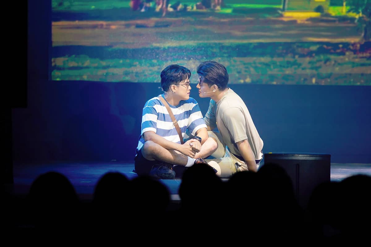PERFORMERS share an intimate moment from 'Hook Up.'