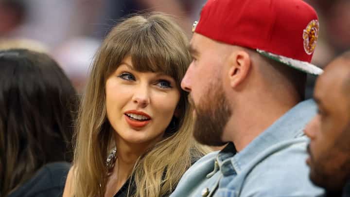 Singer Taylor Swift and Travis Kelce of the Kansas City Chiefs attend Game Three between the New York Knicks and the Cleveland Cavaliers in the NBA Eastern Conference Finals at Rocket Arena on 23 May, 2026 in Cleveland, Ohio.