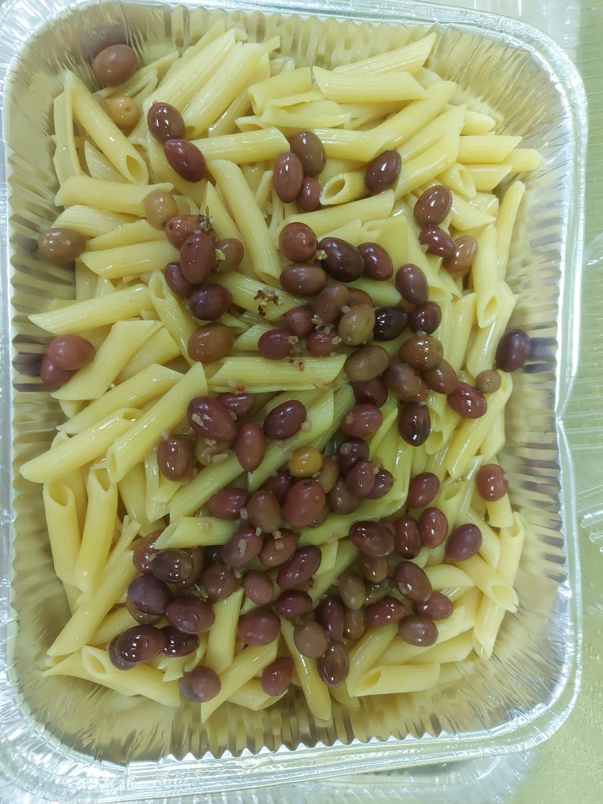 ADINA Smoky Garlic Olives have the right saltiness to balance the starchiness of penne pasta.