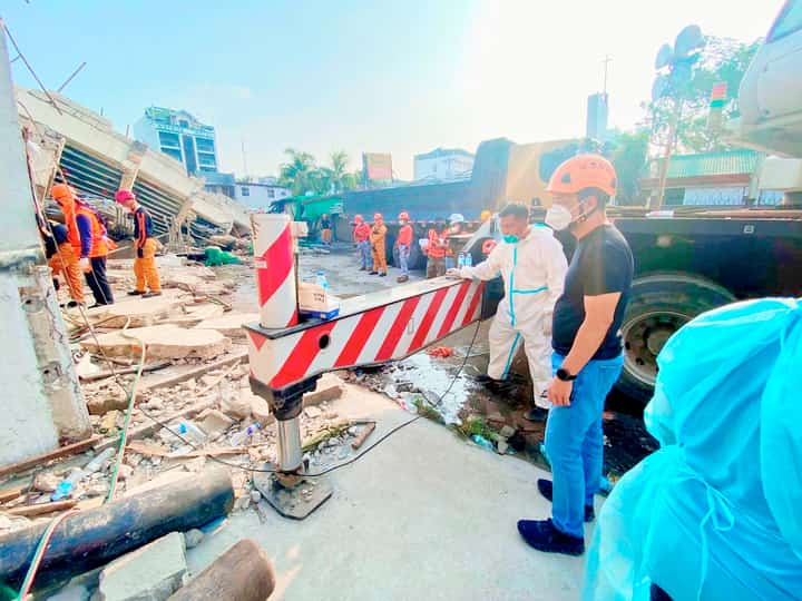 OFFICIALS from the local government of Angeles City visit the site of the building collapse Thursday after rescue teams recovered the fifth casualty from the rubble at 7:57 a.m. The male victim was transported by the City Health Office for disaster victim identification procedures, while a recovered cellphone believed to belong to him was turned over to crime scene operatives.