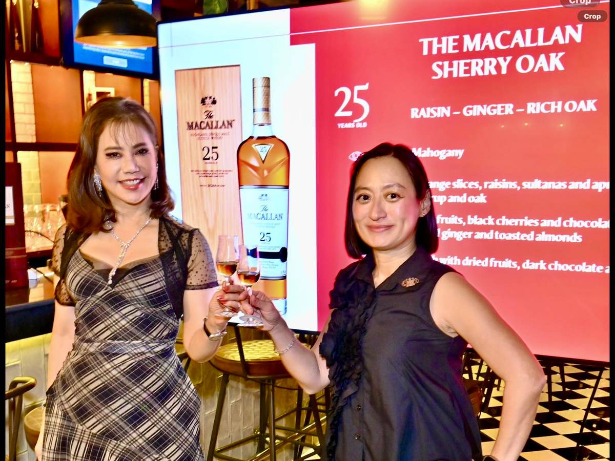 THE columnist and Ivy Ong of Macallan.