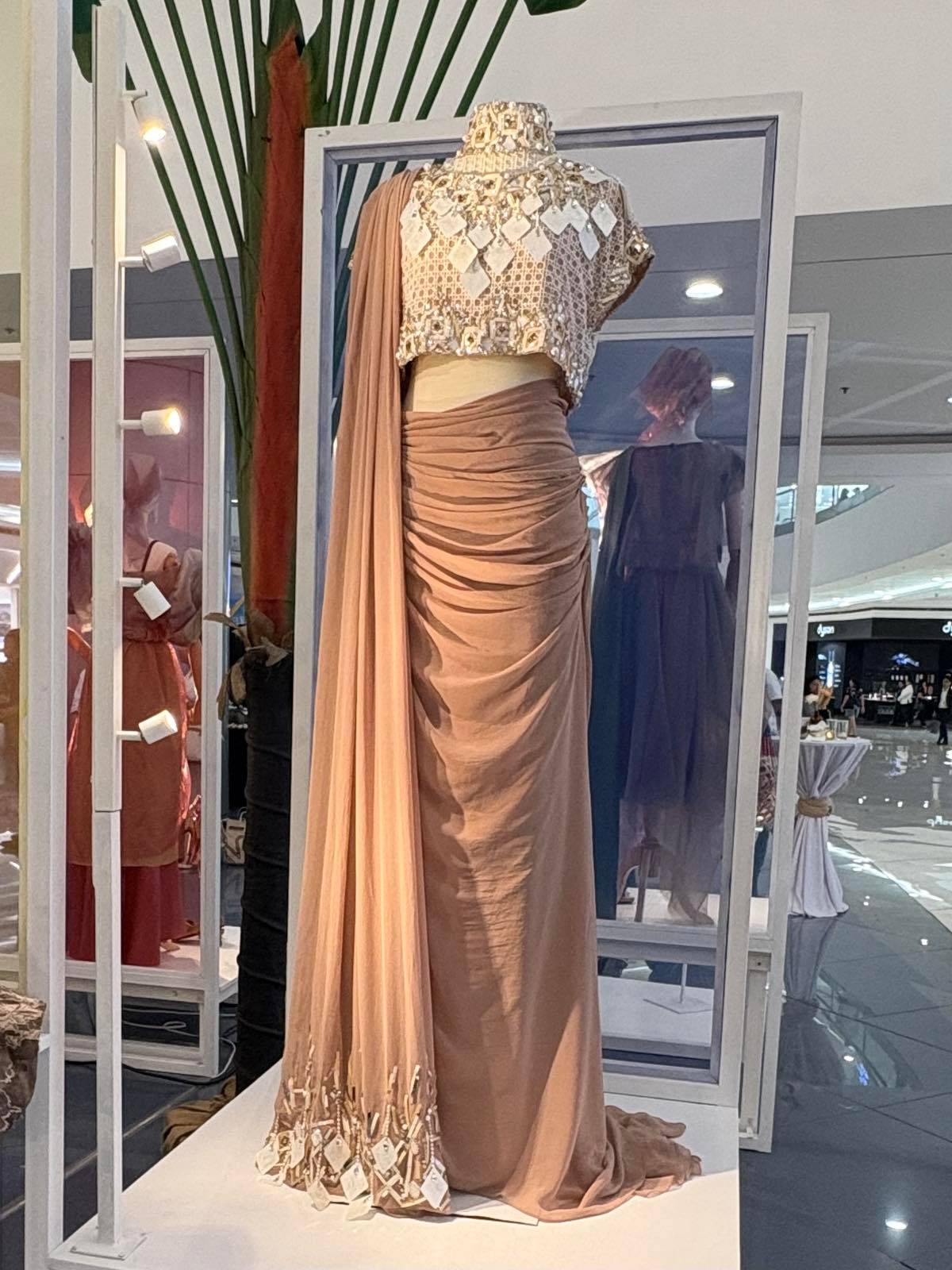 Ezra Santos from South Cotabato showcases an elegant terno piece.