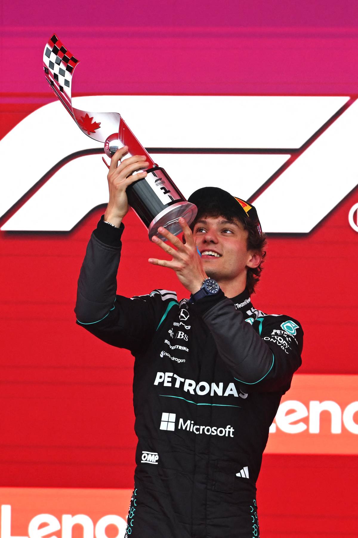 ANTONELLI lifts the Canadian Grand Prix trophy after his fourth straight victory tightened his grip on the drivers’ title race.