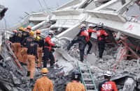 RESPONDERS race against time to locate possible survivors trapped inside a collapsed structure in Pampanga. Rescue radar equipment has detected four moving signals beneath the rubble at ground zero.