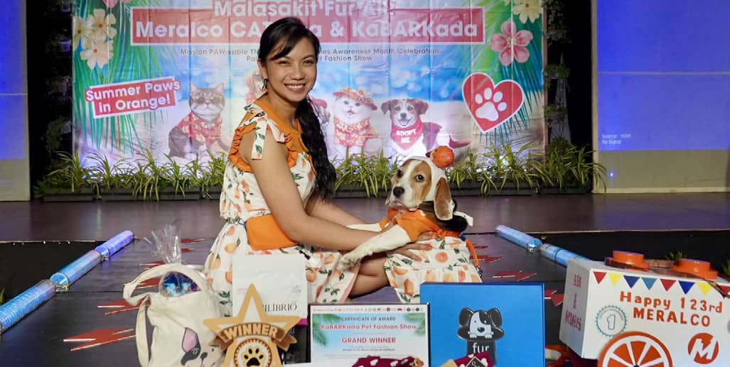 GEAGLES, the 2026 KaBARKada Pet Fashion Show Grand Winner, shares the spotlight with fur parent Kimberly Noelle Bucao—a
joyful celebration of responsible pet ownership and the special bond between pets and their families.