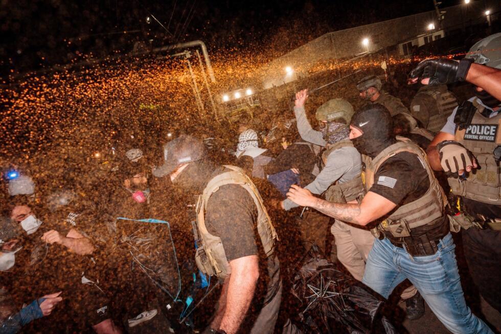 Clashes mar protests at immigration 
detention center