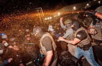 Clashes mar protests at immigration
detention center