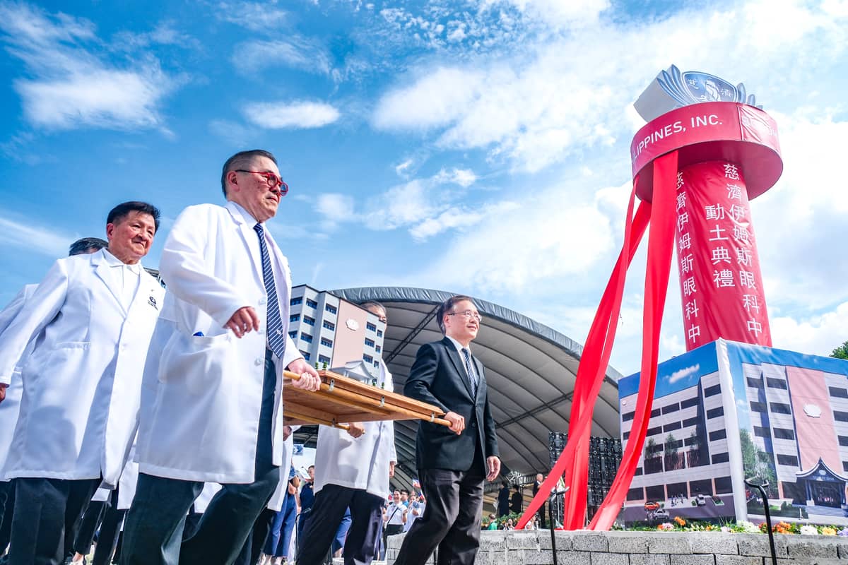 DR. Antonio Say (center), president of Tzu Chi Medical Foundation Philippines, and volunteers of the humanitarian organization present the scale model of the Tzu Chi Imus Eye Center during the groundbreaking ceremony for the facility in Imus, Cavite on 31 May 2026.
