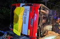 LOCAL authorities assist emergency teams as they respond to a bus collision along Marcos Highway in Tuba, Benguet. Reports disclosed that at least 67 passengers were injured and were transported to nearby hospitals.