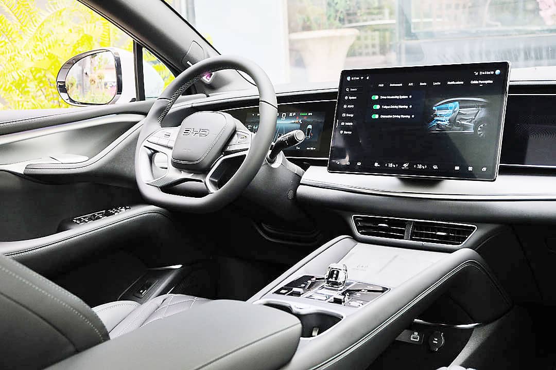 SCREEN controls in the BYD Sealion 7 show the SUV’s driver assistance features and smart cabin functions.