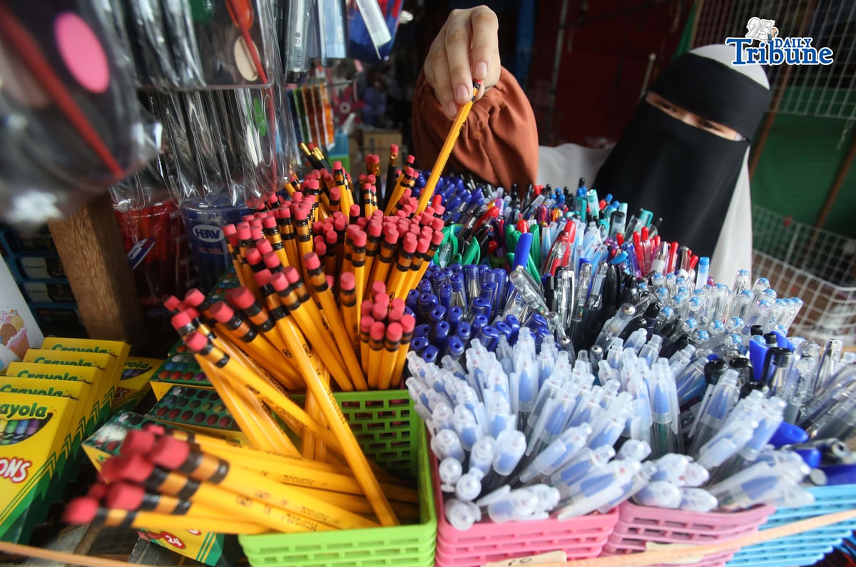 (June 01 2026) Vendors arrange their selling school supplies at a low price at Commonwealth Market in Quezon City, on Monday June 1 2026. Ahead of the year 2026 school opening. Photo/Analy Labor