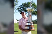RUSSELL Henley lifts the trophy after posting a dramatic win in the PGA Tour Charles Schwab Challenge at the Colonial Country Club in Fort Worth, Texas.