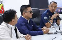NATIONAL Police Commission commissioner Ralph Calinisan (center) leads the presentation of motovlogger Kean James Brul, known online as ‘Sir Ki’ (left) after a viral video showed him allegedly fleeing a Highway Patrol Group officer.