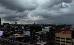 STORM CLOUDS GATHER OVER METRO MANILA