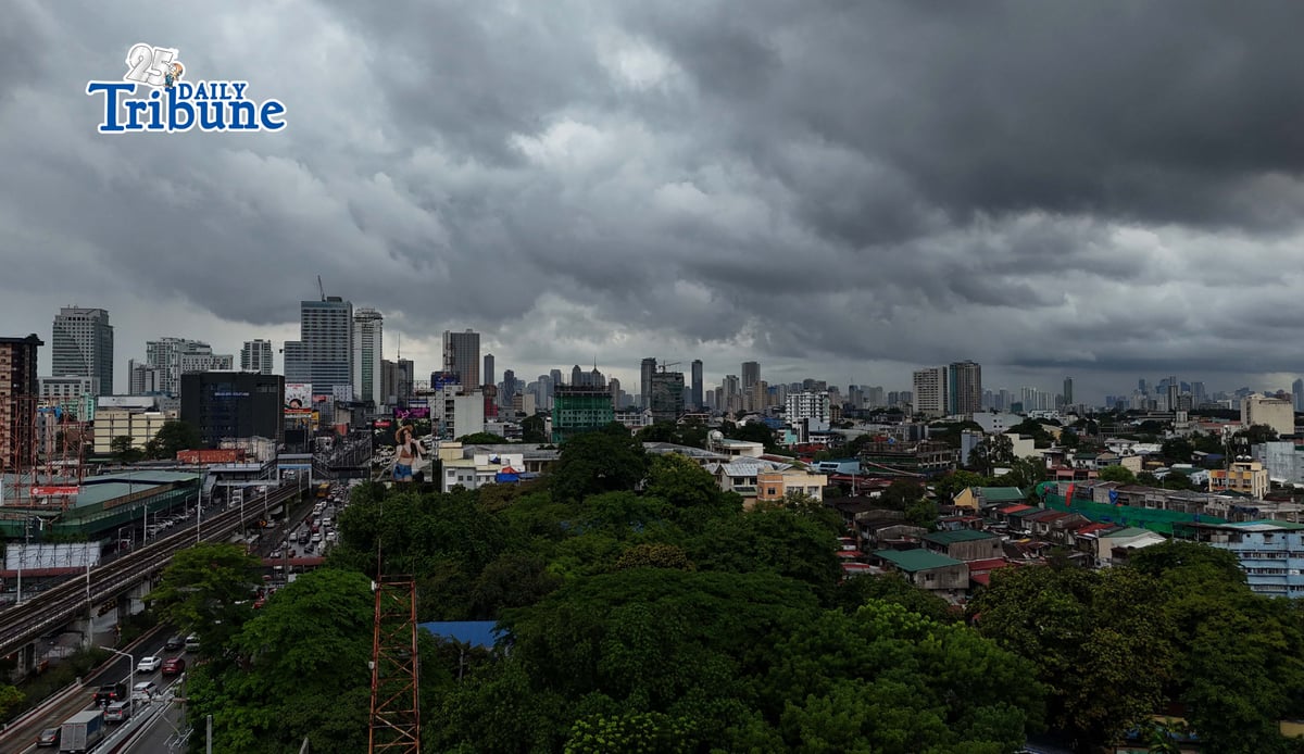 Dark clouds loom over Metro Manila and nearby provinces on Monday as Typhoon Domeng (Jangmi) continues to enhance the southwest monsoon, bringing rains to parts of the country. PAGASA said the storm may exit the Philippine Area of Responsibility by Monday night. | Photo by Analy Labor