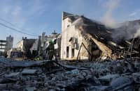 FIREFIGHTERS put out a fire at a car dealership following massive Russian missile and drone strikes on Kyiv, amid the Russian invasion of Ukraine. Russian missile and drone barrages rocked parts of Ukraine, killing four and wounding dozens, officials said, the latest attacks in a war that sees no signs of ending.