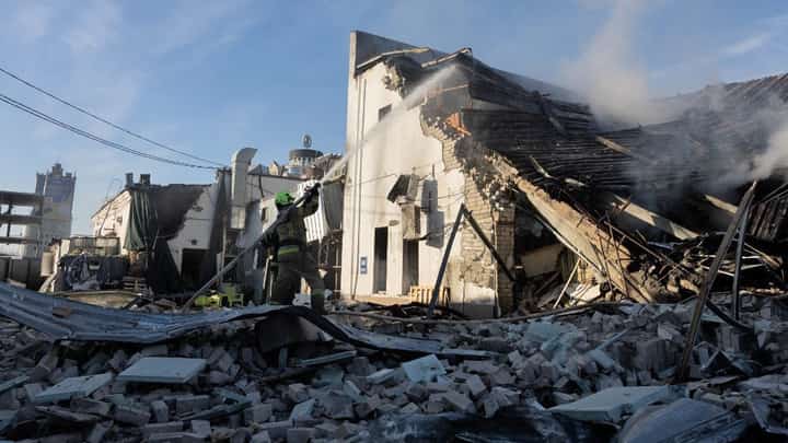 FIREFIGHTERS put out a fire at a car dealership following massive Russian missile and drone strikes on Kyiv, amid the Russian invasion of Ukraine. Russian missile and drone barrages rocked parts of Ukraine, killing four and wounding dozens, officials said, the latest attacks in a war that sees no signs of ending.