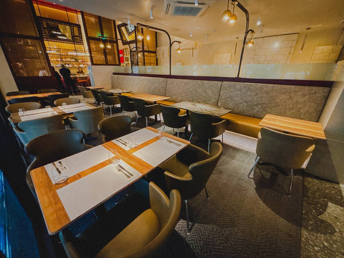 WARM and welcoming is a vibe at Harry's, achieved through earth tones and natural materials