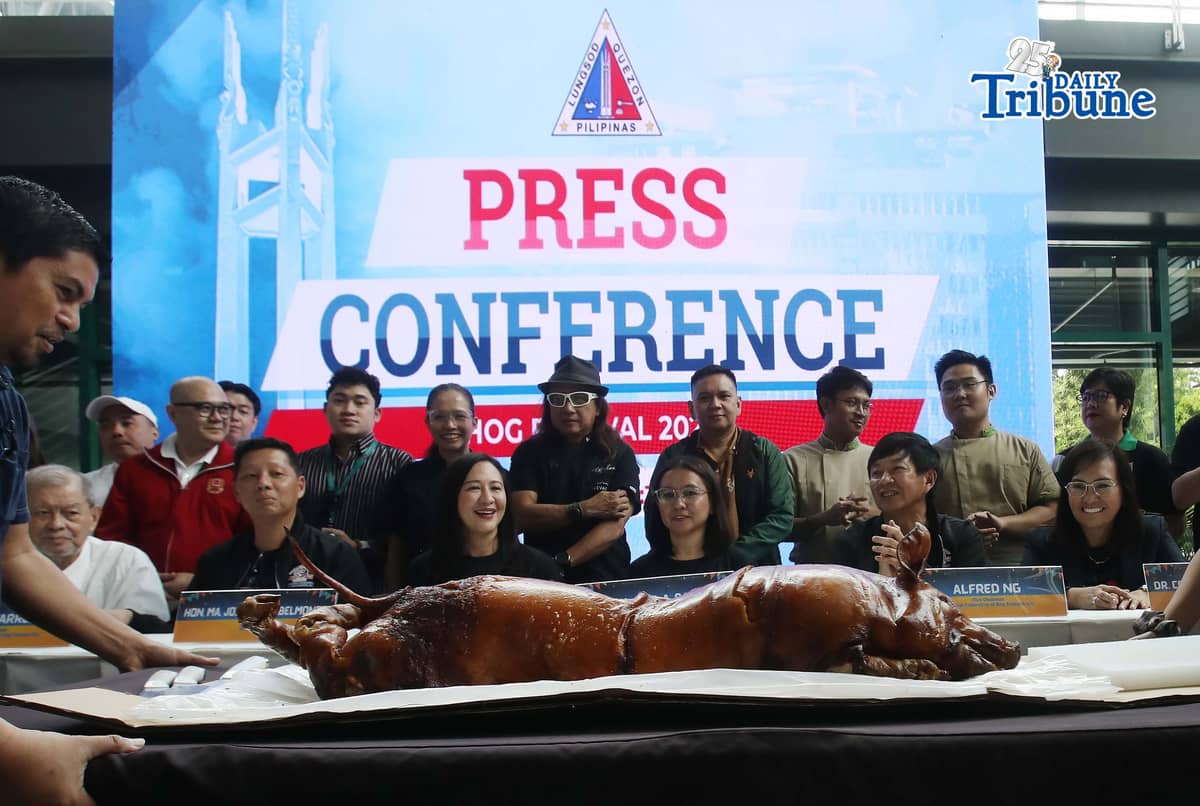 (June 04 2026) Quezon City Mayor Joy Belmonte and National Federation Of Hog Farmers, Inc. (NFHFI) chairman Chester Warren Tan, (NFHFI) chairman emeritus Ceo Bong Mercado pose for photos during the ceremonial lechon chopping as part of the press conference launch of the Hog Festival Pork Labanan 2026 in Quezon City on Thursday, June 4, 2026. Photo/Analy Labor