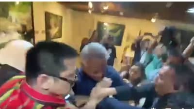 SUITCASE smackdown Series of photos captures the scuffle between Interior and Local Government Secretary Jonvic Remulla (in blue shirt) and Senator Robin Padilla (in striped red shirt) before the start of the Blue Ribbon Committee hearing on the testimonies of 18 Marines who witnessed the distribution of cash-filled suitcases in the Floodgate scandal.