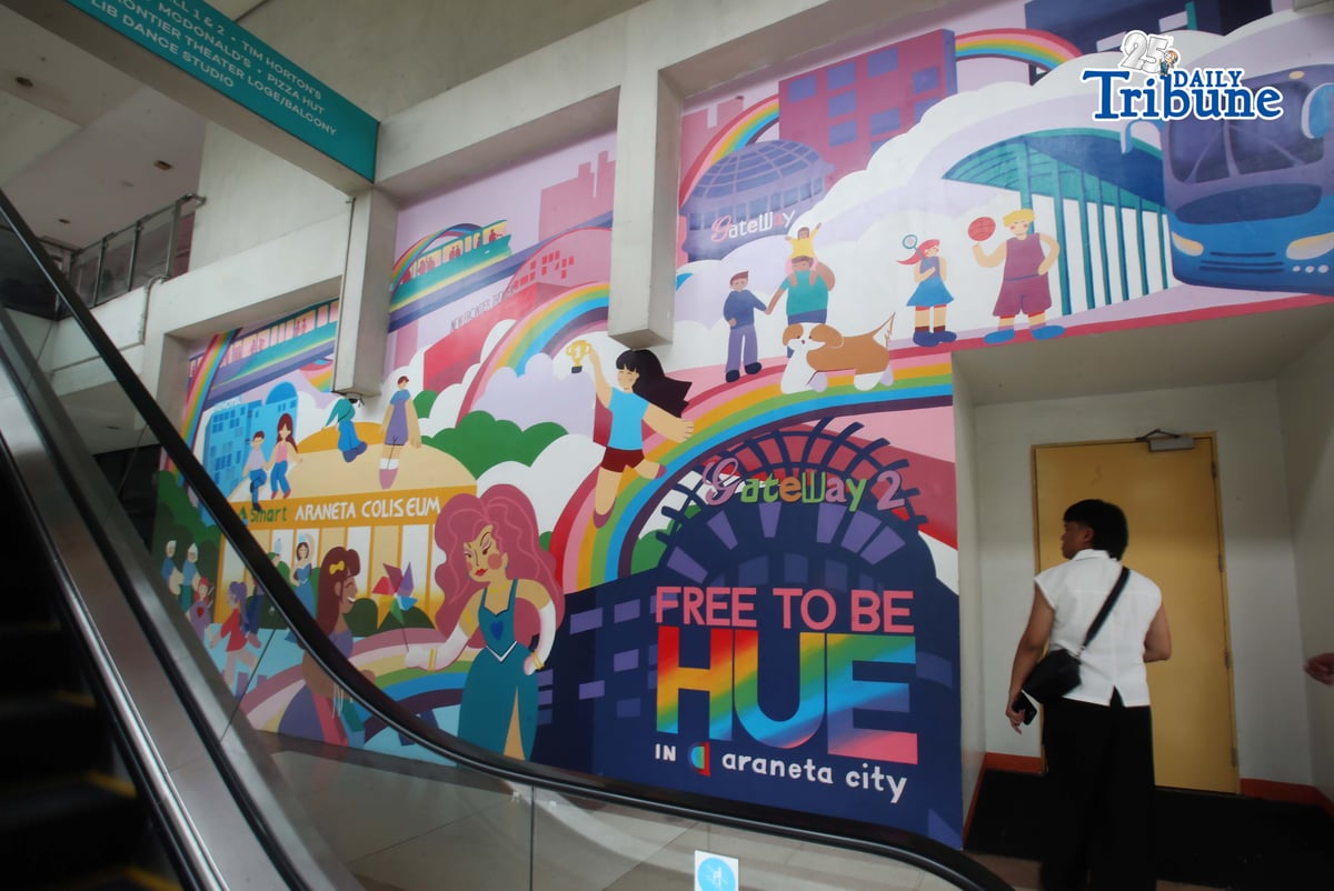 (June 05 2026) Pedestrians walk past the Mural titled “Free to be HUE” at Araneta City in Cubao Quezon City, on Friday June 5 2026. The mural stands as a symbolic and lasting expression of Araneta City’s commitment to inclusivity, acceptance, and self-expression, honoring the LGBTQIA+ community as the celebration of Pride Month starts. Photo/Analy Labor