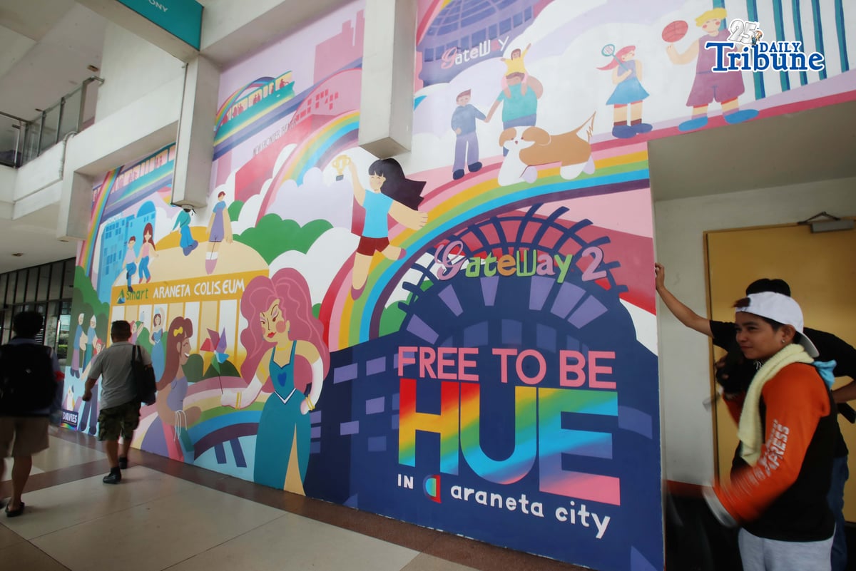 (June 05 2026) Pedestrians walk past the Mural titled “Free to be HUE” at Araneta City in Cubao Quezon City, on Friday June 5 2026. The mural stands as a symbolic and lasting expression of Araneta City’s commitment to inclusivity, acceptance, and self-expression, honoring the LGBTQIA+ community as the celebration of Pride Month starts. Photo/Analy Labor