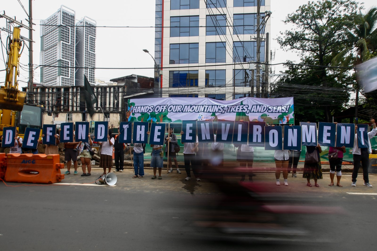 Youth Advocates for Climate Action Philippines protest San Miguel Corporation’s Southern Access Link Expressway (SALEX) project along Quirino Avenue in Manila on World Environment Day, 05 June 2026. Heritage advocates warn that at least 50 cultural and historical landmarks in the city are at risk of damage or demolition due to the construction. The Department of Environment and Natural Resources temporarily suspended the project's tree-cutting and earth-balling operations last week following intense public outcry.