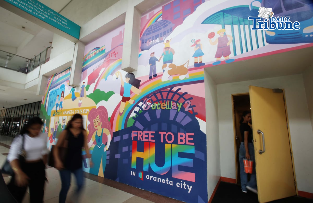 (June 05 2026) Pedestrians walk past the Mural titled “Free to be HUE” at Araneta City in Cubao Quezon City, on Friday June 5 2026. The mural stands as a symbolic and lasting expression of Araneta City’s commitment to inclusivity, acceptance, and self-expression, honoring the LGBTQIA+ community as the celebration of Pride Month starts. Photo/Analy Labor