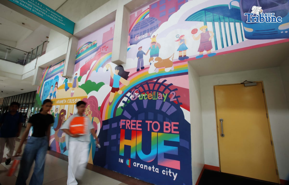 (June 05 2026) Pedestrians walk past the Mural titled “Free to be HUE” at Araneta City in Cubao Quezon City, on Friday June 5 2026. The mural stands as a symbolic and lasting expression of Araneta City’s commitment to inclusivity, acceptance, and self-expression, honoring the LGBTQIA+ community as the celebration of Pride Month starts. Photo/Analy Labor