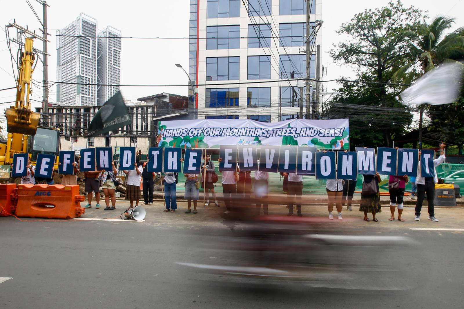Youth Advocates for Climate Action Philippines protest San Miguel Corporation’s Southern Access Link Expressway (SALEX) project along Quirino Avenue in Manila on World Environment Day, 05 June 2026. Heritage advocates warn that at least 50 cultural and historical landmarks in the city are at risk of damage or demolition due to the construction. The Department of Environment and Natural Resources temporarily suspended the project's tree-cutting and earth-balling operations last week following intense public outcry.