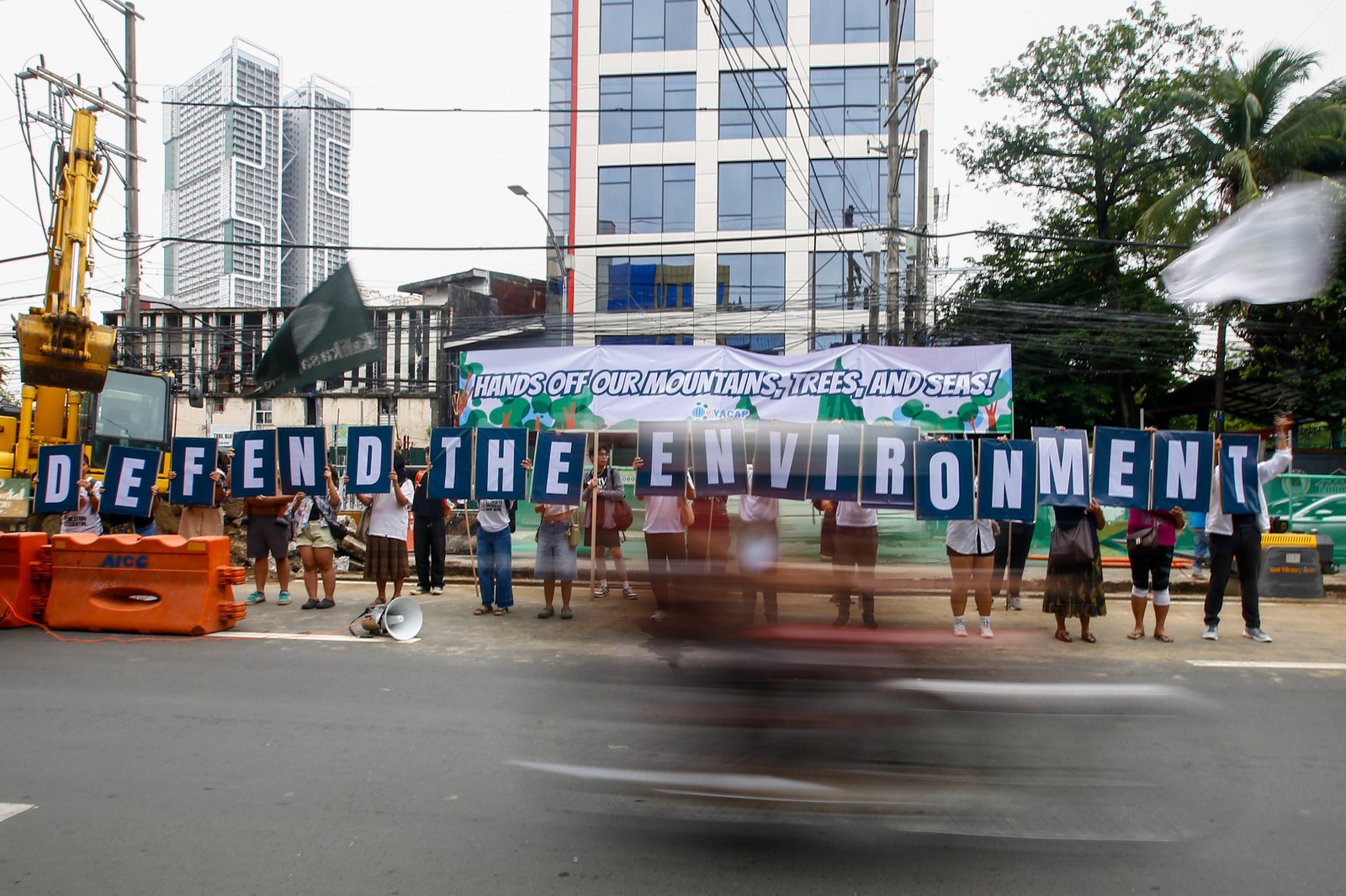 Youth Advocates for Climate Action Philippines protest San Miguel Corporation’s Southern Access Link Expressway (SALEX) project along Quirino Avenue in Manila on World Environment Day, 05 June 2026. Heritage advocates warn that at least 50 cultural and historical landmarks in the city are at risk of damage or demolition due to the construction. The Department of Environment and Natural Resources temporarily suspended the project's tree-cutting and earth-balling operations last week following intense public outcry.