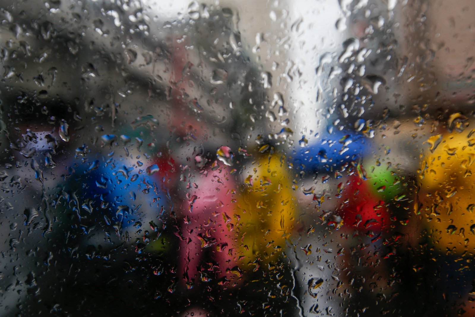 Motorists and commuters in Divisoria, Manila brave intermittent rains brought by Tropical Depression Ester, which has enhanced the southwest monsoon. The downpour comes shortly after PAGASA officially declared the start of the rainy season.