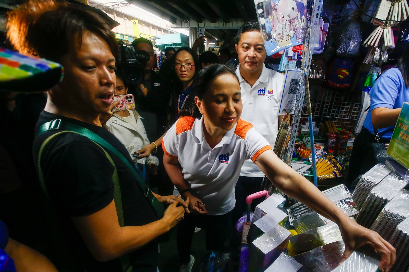 Department of Trade and Industry (DTI) Secretary Ma. Cristina Roque inspects school supplies during a price and supply monitoring operation at Taft Avenue Extension in Pasay City on 06 June 2026. Secretary Roque reported that local retailers are strictly complying with the agency's suggested retail prices (SRP) ahead of the upcoming school year, with some vendors even selling goods below the SRP to ease the financial burden on consumers.